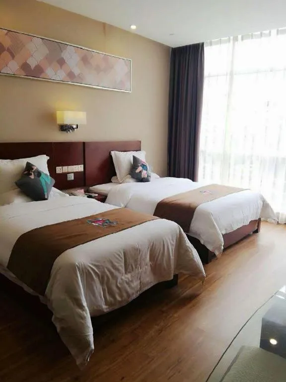 Bed in PAI Hotel Guangzhou North Gate of Chimelong Zoo