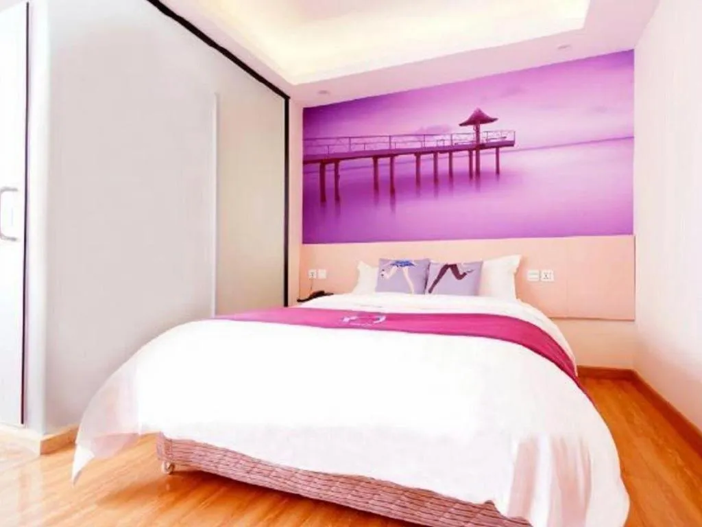 Bed in PAI Hotel Guangzhou North Gate of Chimelong Zoo