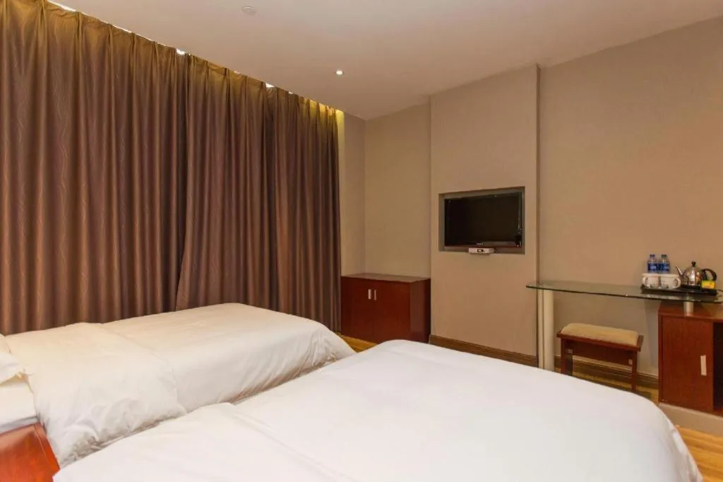 Bed in PAI Hotel Guangzhou North Gate of Chimelong Zoo