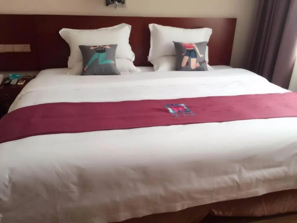 Bed in PAI Hotel Guangzhou North Gate of Chimelong Zoo