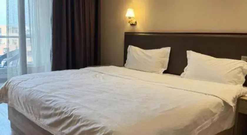 Bed in PAI Hotel Guangzhou North Gate of Chimelong Zoo Bed in PAI Hotel Guangzhou North Gate of Chimelong Zoo
