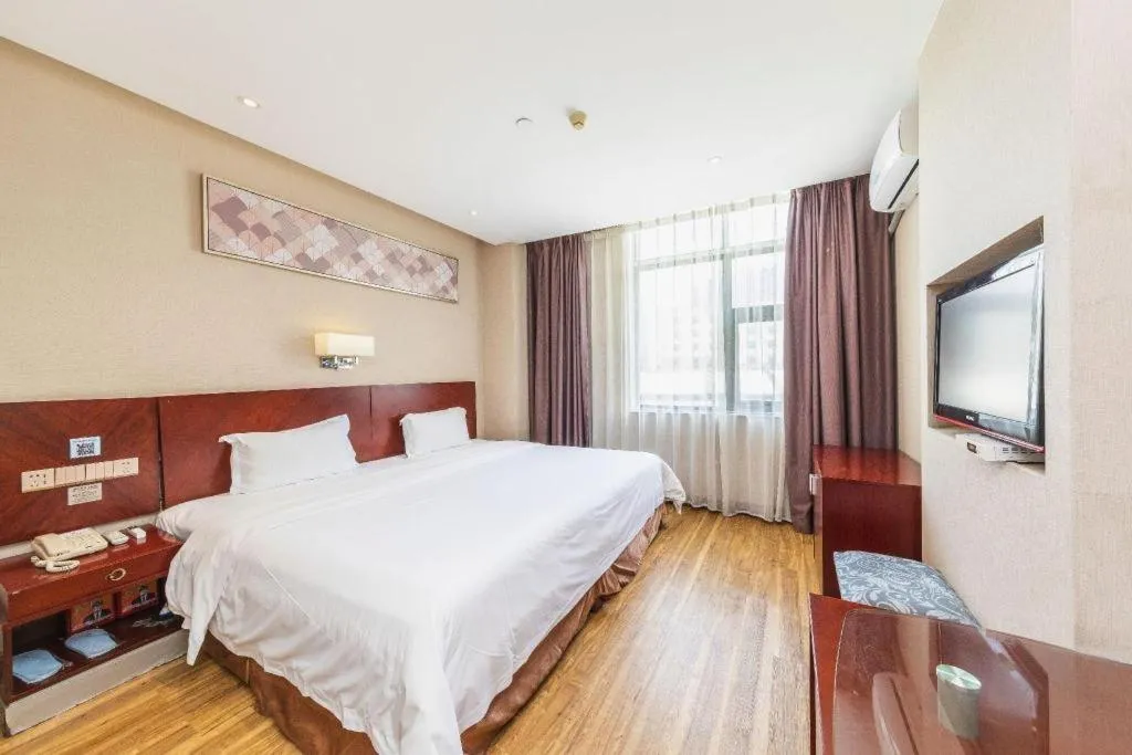 Bed in PAI Hotel Guangzhou North Gate of Chimelong Zoo