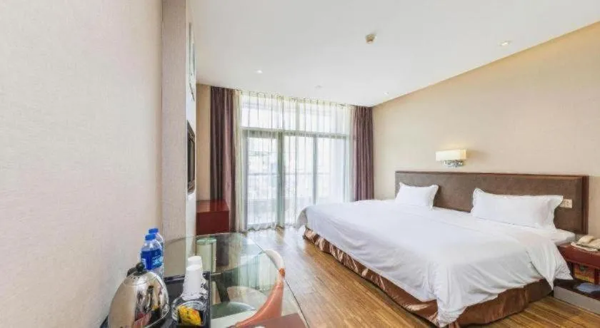 Bed in PAI Hotel Guangzhou North Gate of Chimelong Zoo