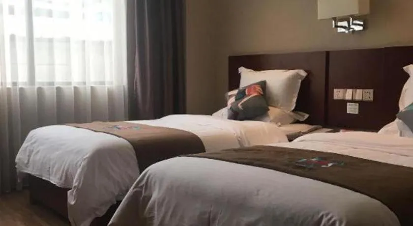 Bed in PAI Hotel Guangzhou North Gate of Chimelong Zoo