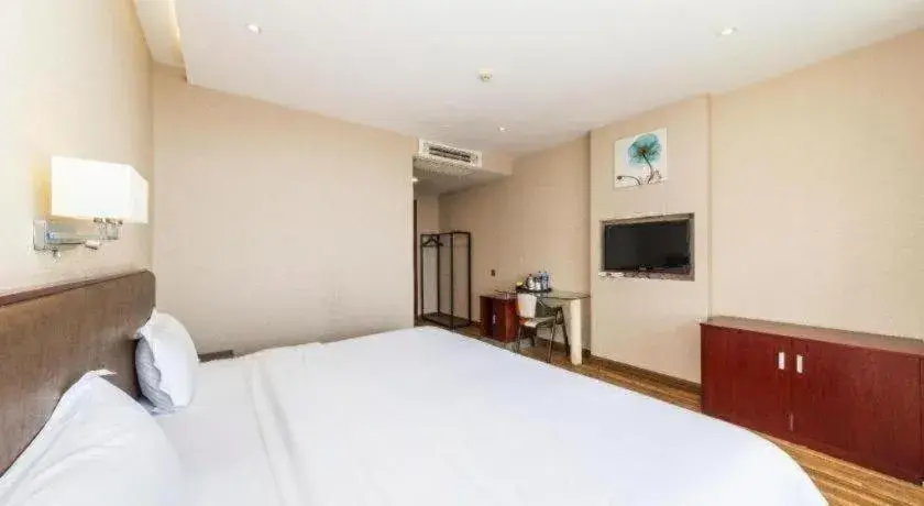 Bed in PAI Hotel Guangzhou North Gate of Chimelong Zoo Bed in PAI Hotel Guangzhou North Gate of Chimelong Zoo