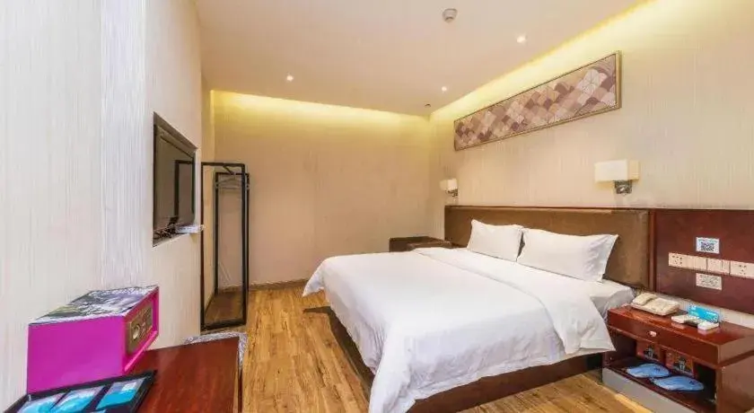 Bed in PAI Hotel Guangzhou North Gate of Chimelong Zoo Bed in PAI Hotel Guangzhou North Gate of Chimelong Zoo