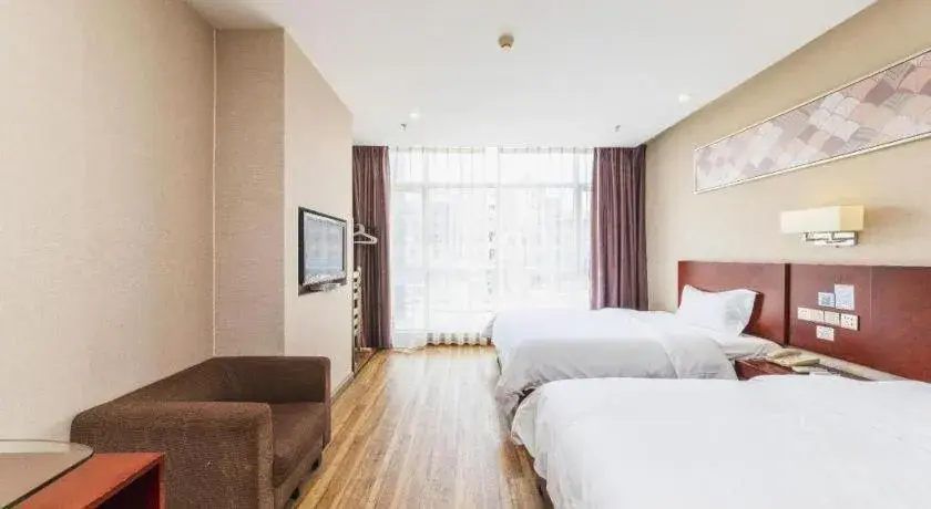 Bed in PAI Hotel Guangzhou North Gate of Chimelong Zoo Bed in PAI Hotel Guangzhou North Gate of Chimelong Zoo