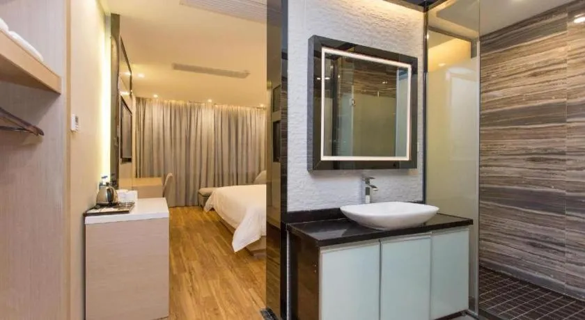 Bed in PAI Hotel Guangzhou North Gate of Chimelong Zoo