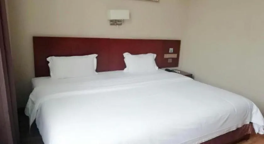 Bed in PAI Hotel Guangzhou North Gate of Chimelong Zoo