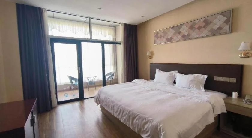 Bed in PAI Hotel Guangzhou North Gate of Chimelong Zoo