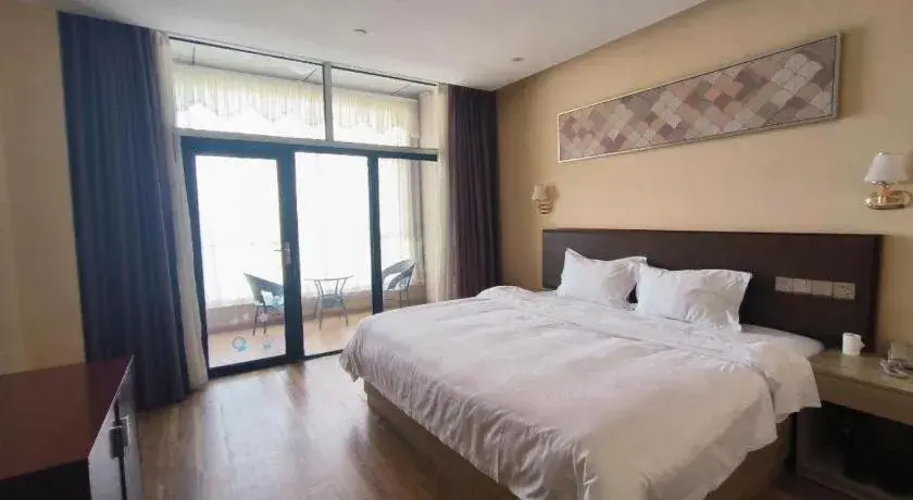 Bed in PAI Hotel Guangzhou North Gate of Chimelong Zoo Bed in PAI Hotel Guangzhou North Gate of Chimelong Zoo