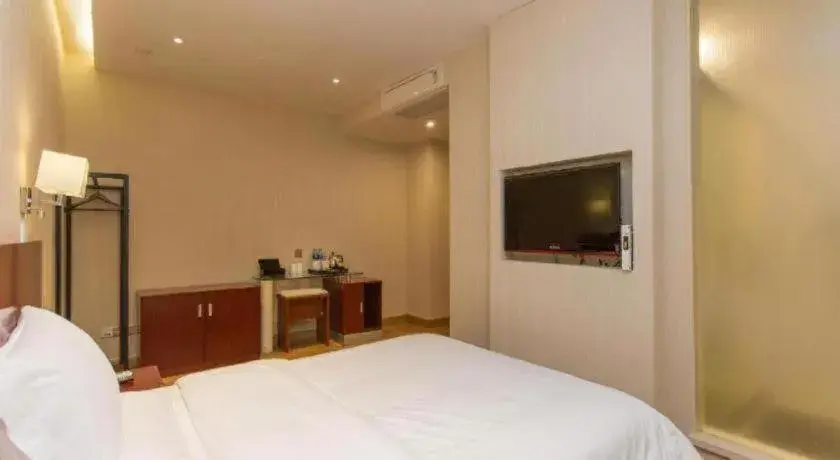 Bed in PAI Hotel Guangzhou North Gate of Chimelong Zoo Bed in PAI Hotel Guangzhou North Gate of Chimelong Zoo