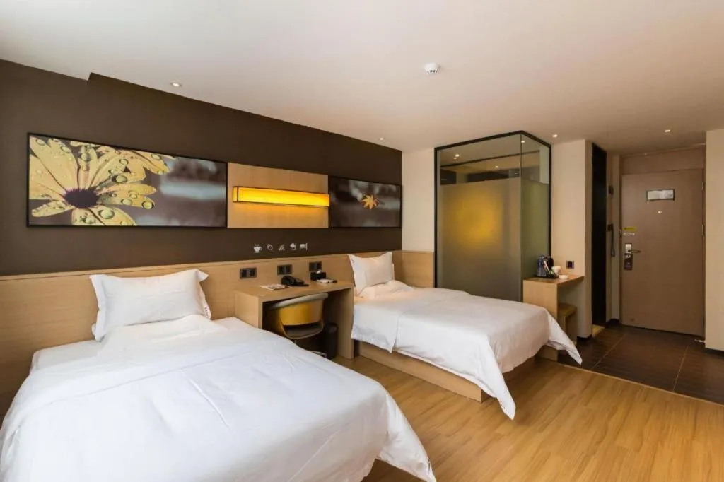 Bed in IU Hotels Guangzhou Panyu Dashi Chimelong Safari Park