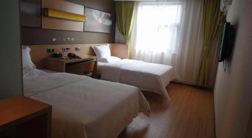 Bed in IU Hotels Guangzhou Panyu Dashi Chimelong Safari Park