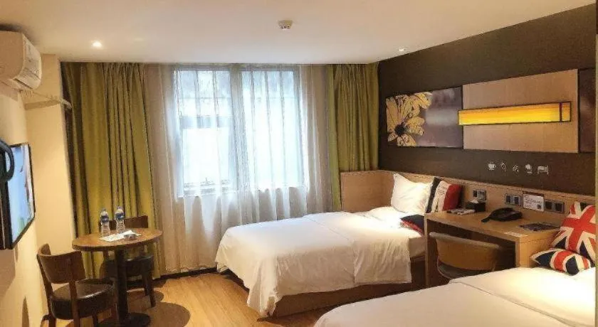 Bed in IU Hotels Guangzhou Panyu Dashi Chimelong Safari Park