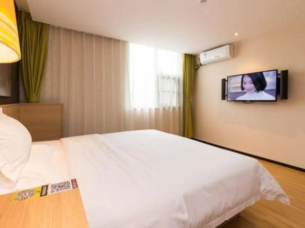 Bed in IU Hotels Guangzhou Panyu Dashi Chimelong Safari Park