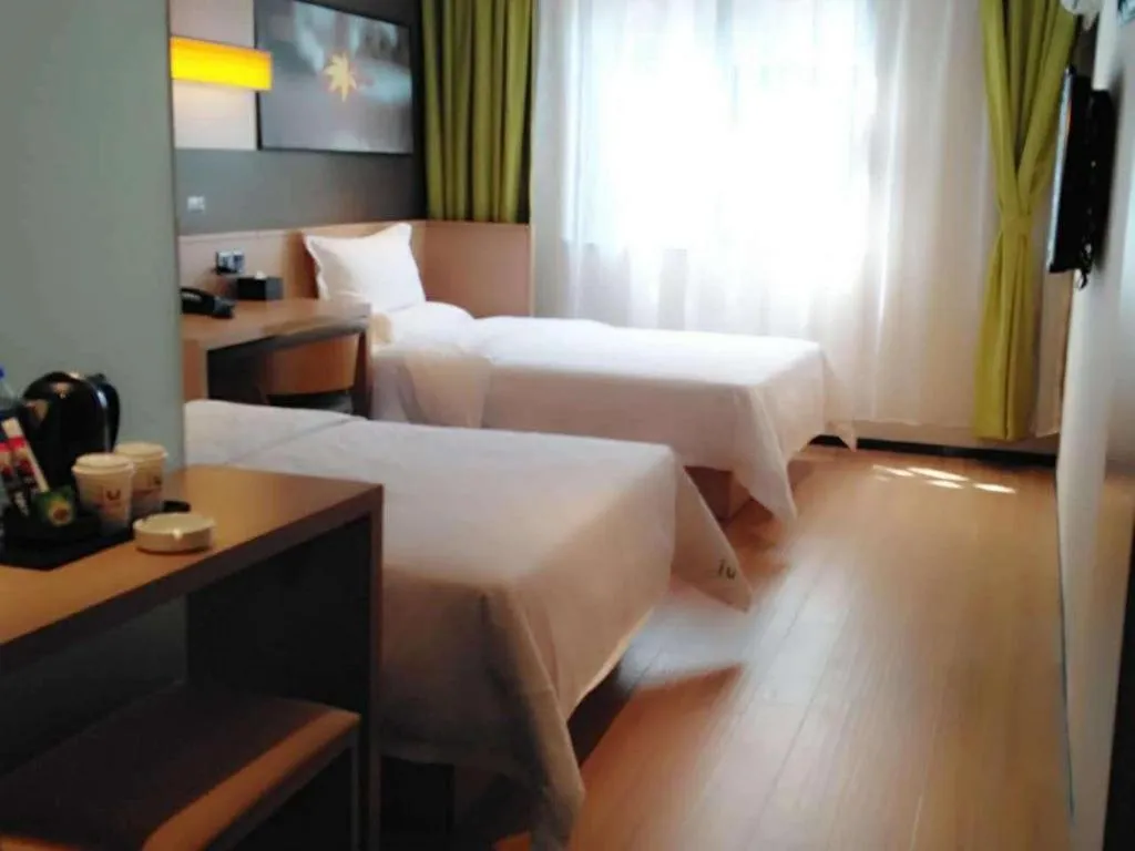 Bed in IU Hotels Guangzhou Panyu Dashi Chimelong Safari Park