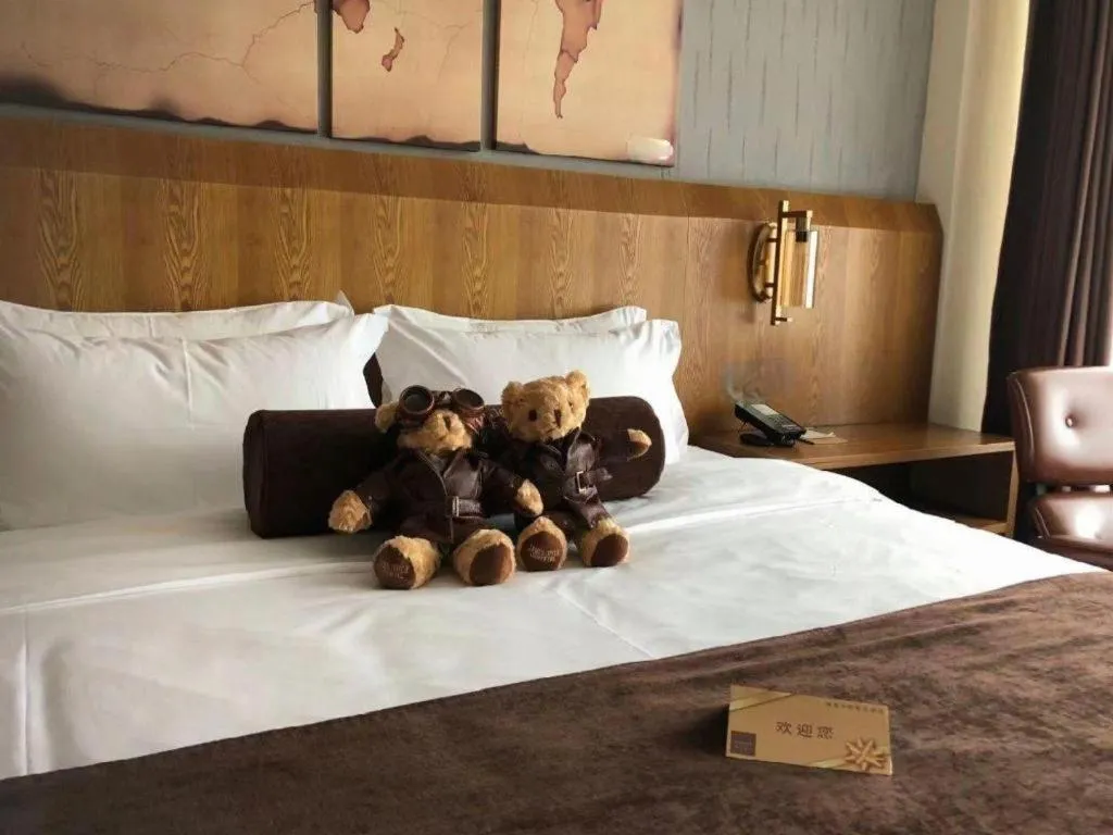 Bed in James Joyce Coffetel Shijiazhuang Century Park Shiji Huamao