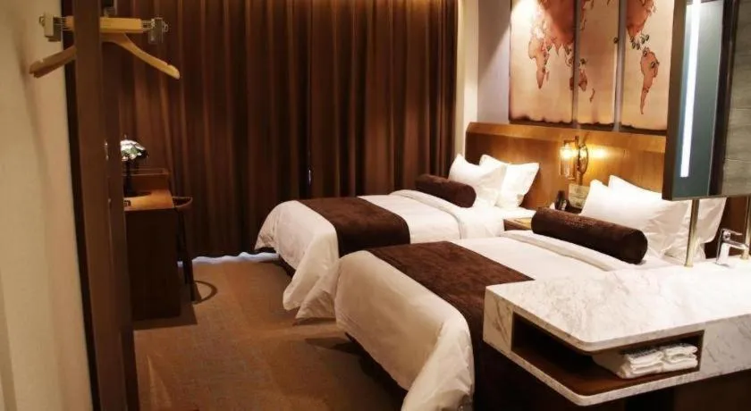 Bed in James Joyce Coffetel Shijiazhuang Century Park Shiji Huamao