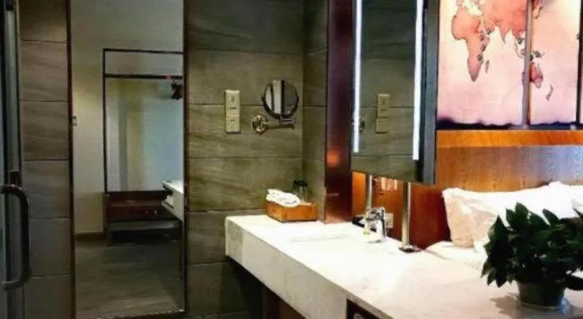 Bed in James Joyce Coffetel Shijiazhuang Century Park Shiji Huamao