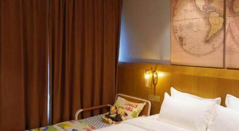 Bed in James Joyce Coffetel Shijiazhuang Century Park Shiji Huamao