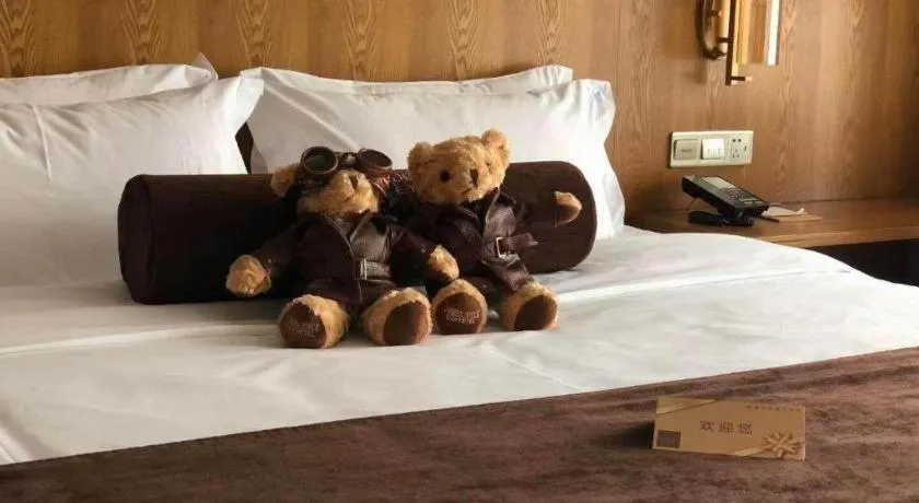 Bed in James Joyce Coffetel Shijiazhuang Century Park Shiji Huamao