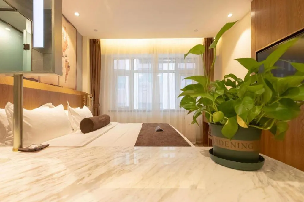 Bed in James Joyce Coffetel Shijiazhuang Century Park Shiji Huamao