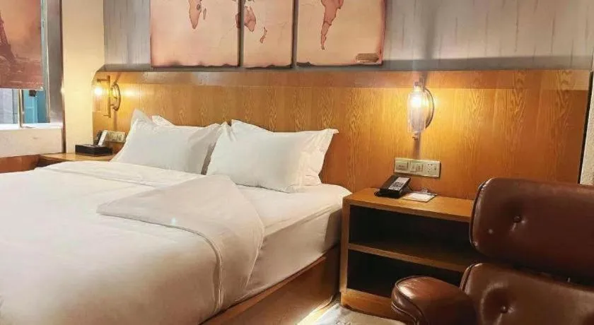 Bed in James Joyce Coffetel Shijiazhuang Century Park Shiji Huamao