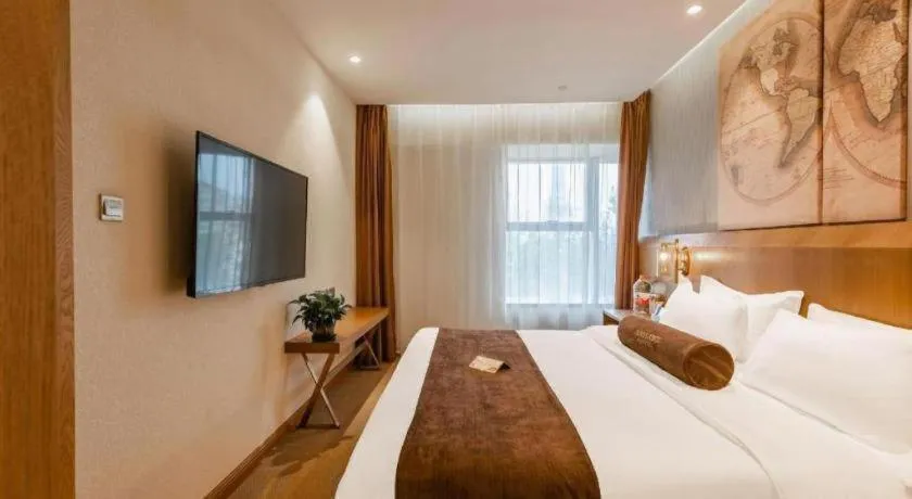 Bed in James Joyce Coffetel Shijiazhuang Century Park Shiji Huamao