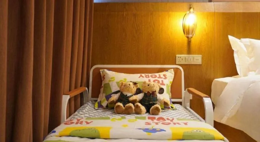 Bed in James Joyce Coffetel Shijiazhuang Century Park Shiji Huamao