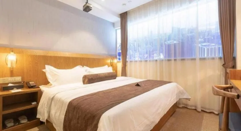 Bed in James Joyce Coffetel Shijiazhuang Century Park Shiji Huamao