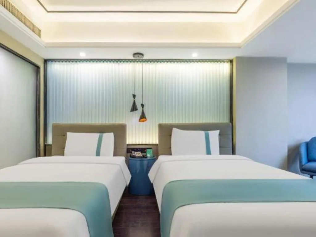 Bed in Xana Hotelle Wuhan Lingjiao Lake Wanda Plaza Branch