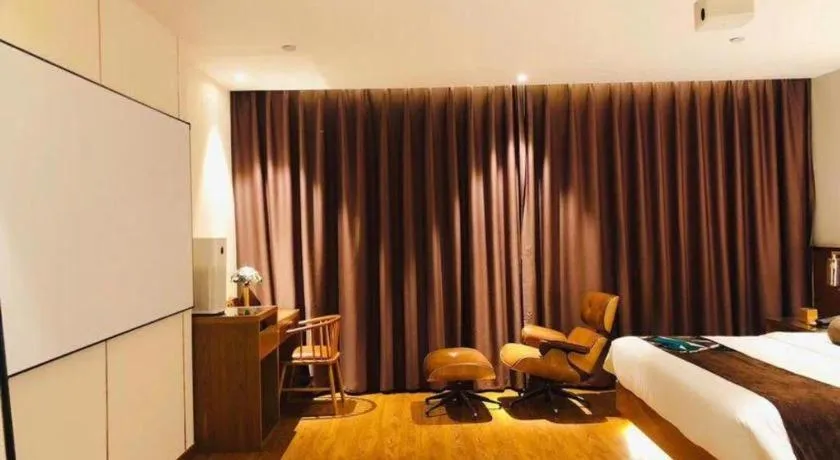 Bed in James Joyce Coffetel Wuhan Huanlegu Renhe Road Subway Station