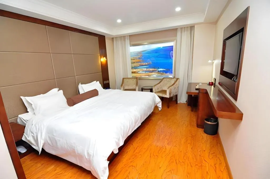 Bed in James Joyce Coffetel Wuhan Huanlegu Renhe Road Subway Station