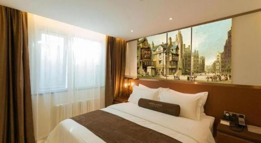 Bed in James Joyce Coffetel Beijing Qianmen Branch