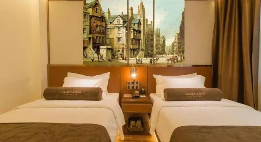 Bed in James Joyce Coffetel Beijing Qianmen Branch Bed in James Joyce Coffetel Beijing Qianmen Branch