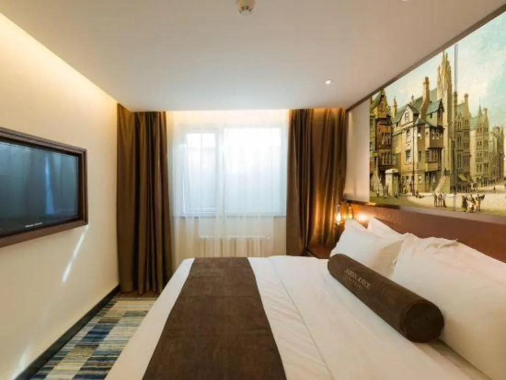 Bed in James Joyce Coffetel Beijing Qianmen Branch