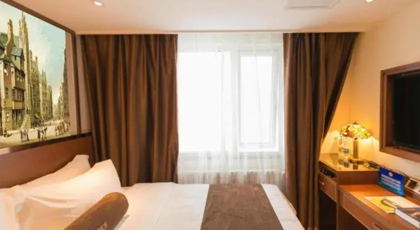 Bed in James Joyce Coffetel Beijing Qianmen Branch Bed in James Joyce Coffetel Beijing Qianmen Branch