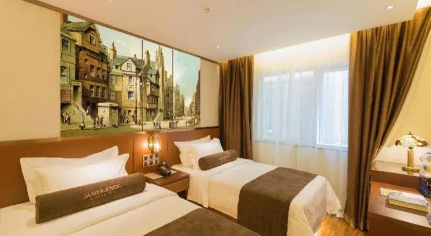 Bed in James Joyce Coffetel Beijing Qianmen Branch Bed in James Joyce Coffetel Beijing Qianmen Branch