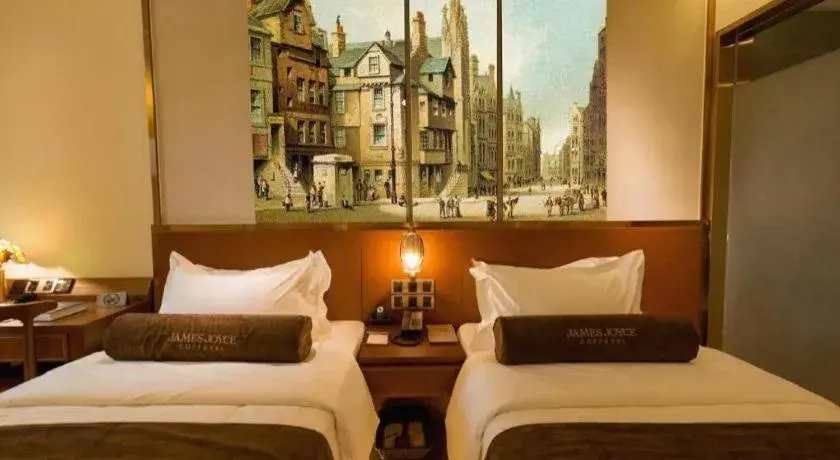 Bed in James Joyce Coffetel Beijing Qianmen Branch Bed in James Joyce Coffetel Beijing Qianmen Branch