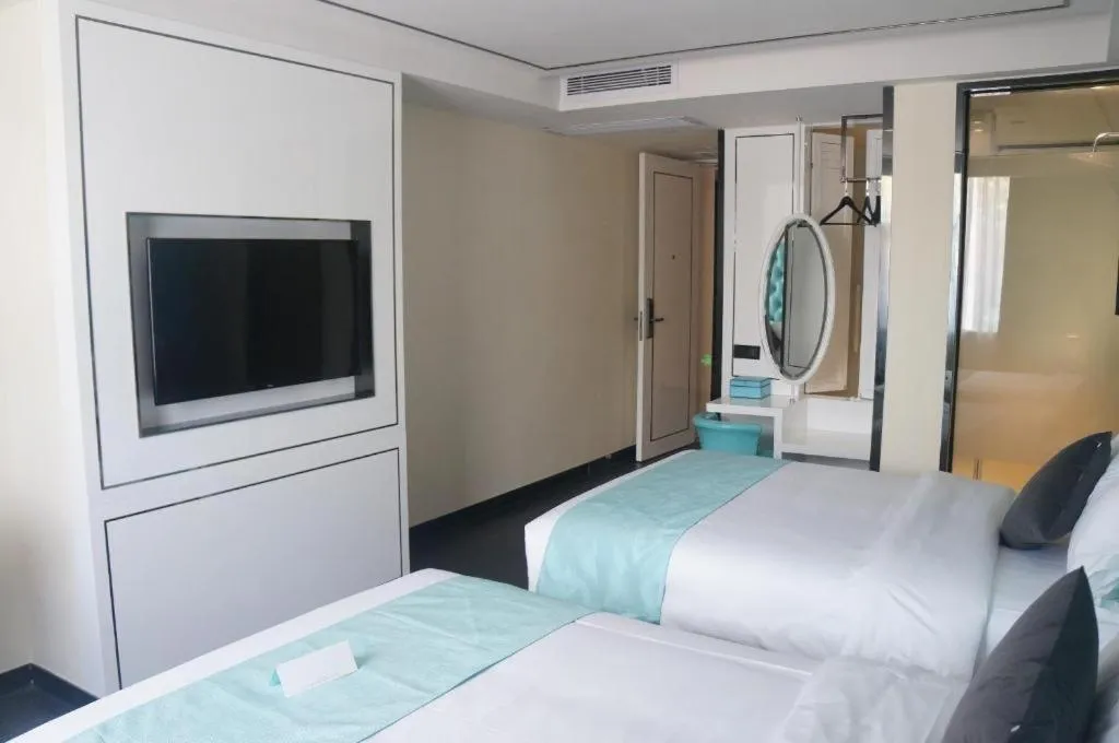 Bed in Xana Lite Hotel Shenzhen Nanshan Xilichaguang Metro Station