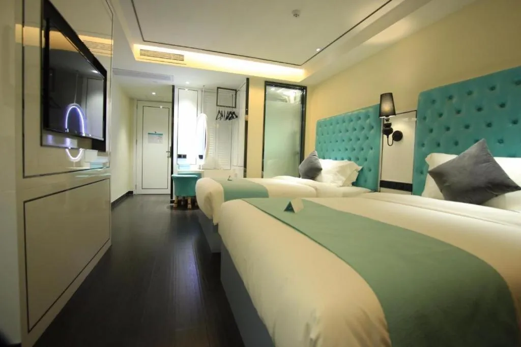 Bed in Xana Lite Hotel Shenzhen Nanshan Xilichaguang Metro Station