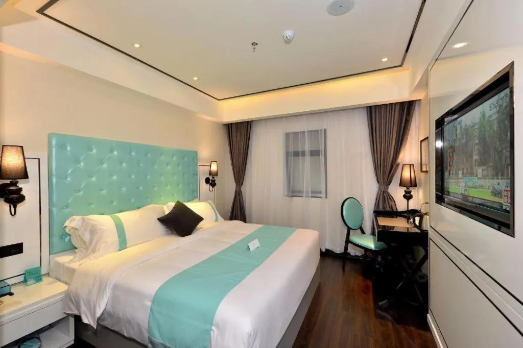 Bed in Xana Lite Hotel Shenzhen Nanshan Xilichaguang Metro Station