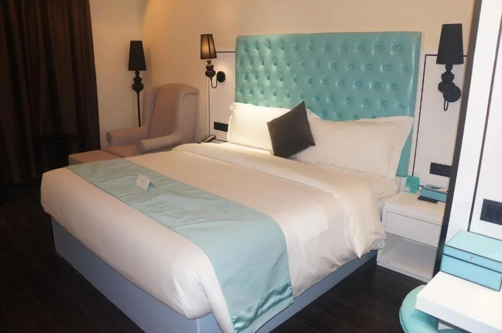 Bed in Xana Lite Hotel Shenzhen Nanshan Xilichaguang Metro Station