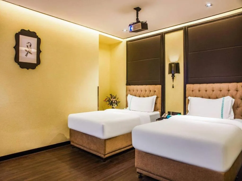 Bed in Xana Hotelle Beijing Olympic Park South Lishuiqiao Metro Station