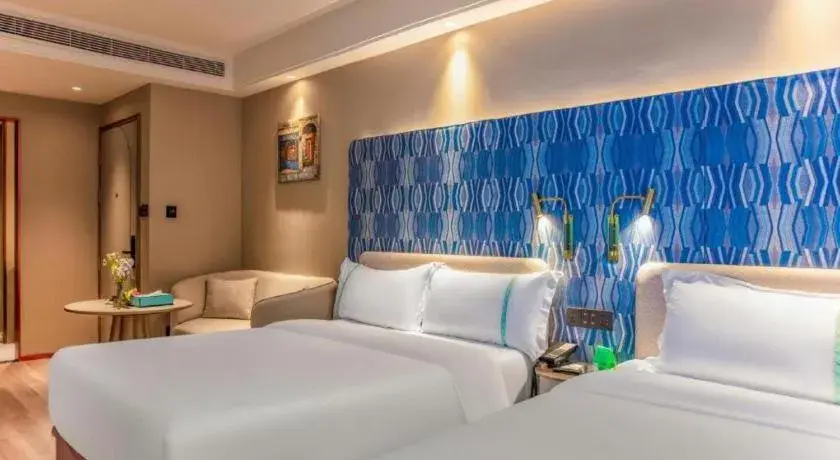 Bed in Xana Hotelle Beijing Olympic Park South Lishuiqiao Metro Station Bed in Xana Hotelle Beijing Olympic Park South Lishuiqiao Metro Station