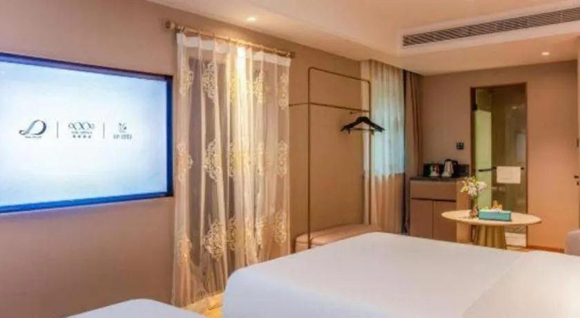 Bed in Xana Hotelle Beijing Olympic Park South Lishuiqiao Metro Station