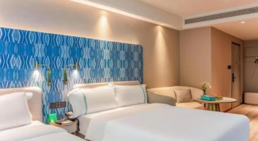 Bed in Xana Hotelle Beijing Olympic Park South Lishuiqiao Metro Station