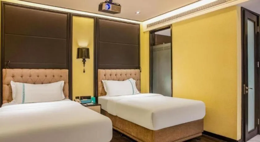 Bed in Xana Hotelle Beijing Olympic Park South Lishuiqiao Metro Station