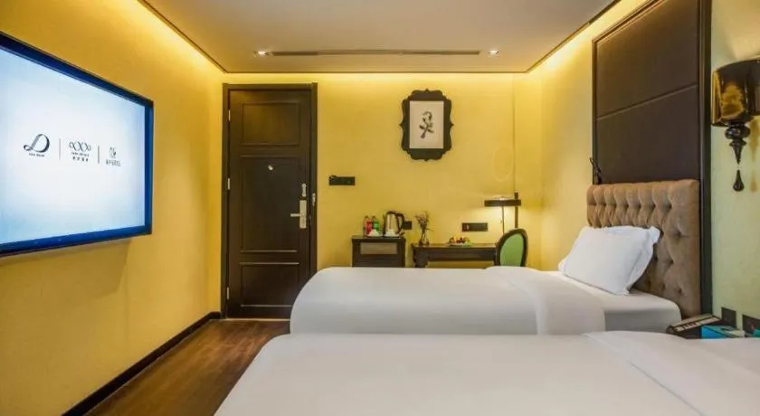 Bed in Xana Hotelle Beijing Olympic Park South Lishuiqiao Metro Station